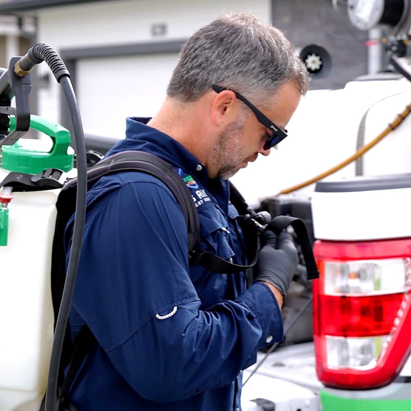 Gray Pest Control technician treating a Northeast Florida home for bed bugs